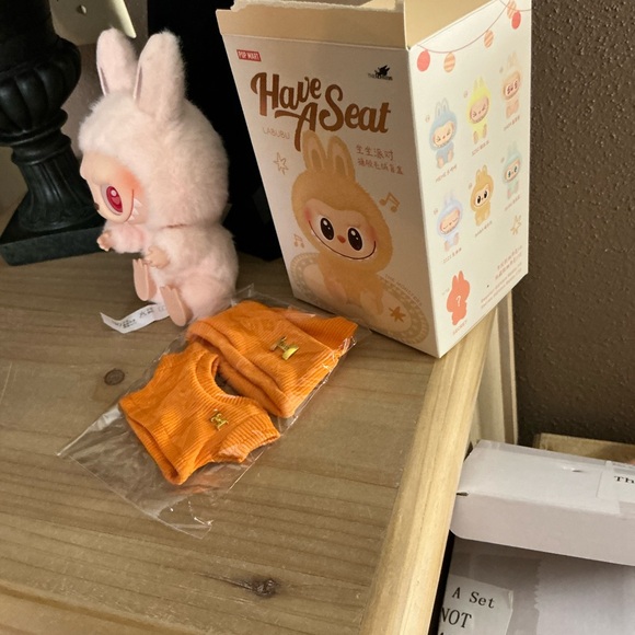 Coach Blush Butterfly Rivets Corner Zip Wristlet plus a Pop Mart lil’ Monster - Picture 13 of 15